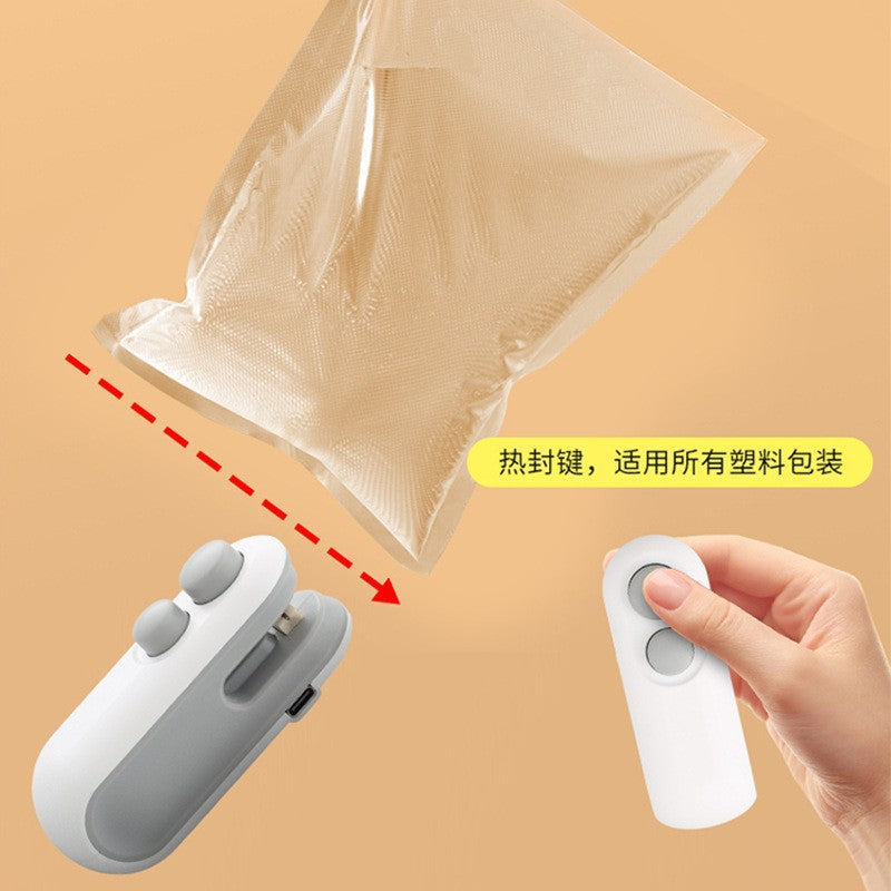 Sealing machine sealing new small portable snack artifact household magnetic hand pressure plastic bag sealing mini