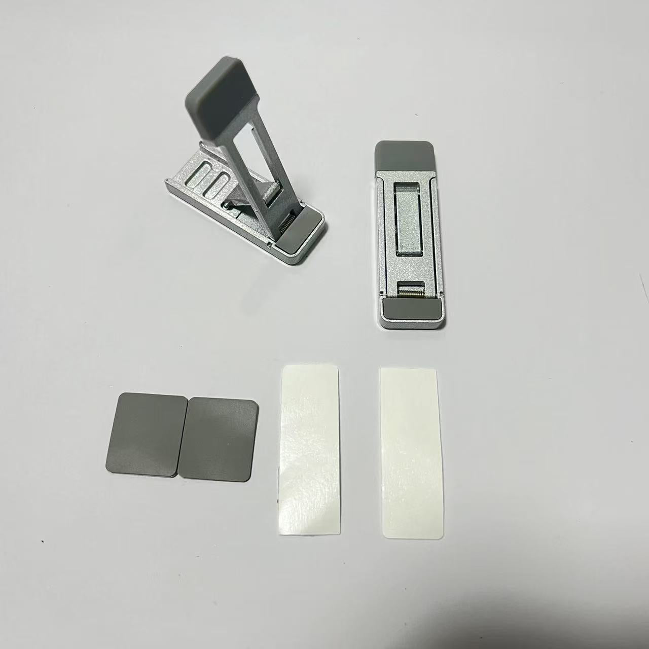 Cross-border zinc alloy notebook stand creative three-speed adjustable invisible portable heightened heat dissipation tablet holder